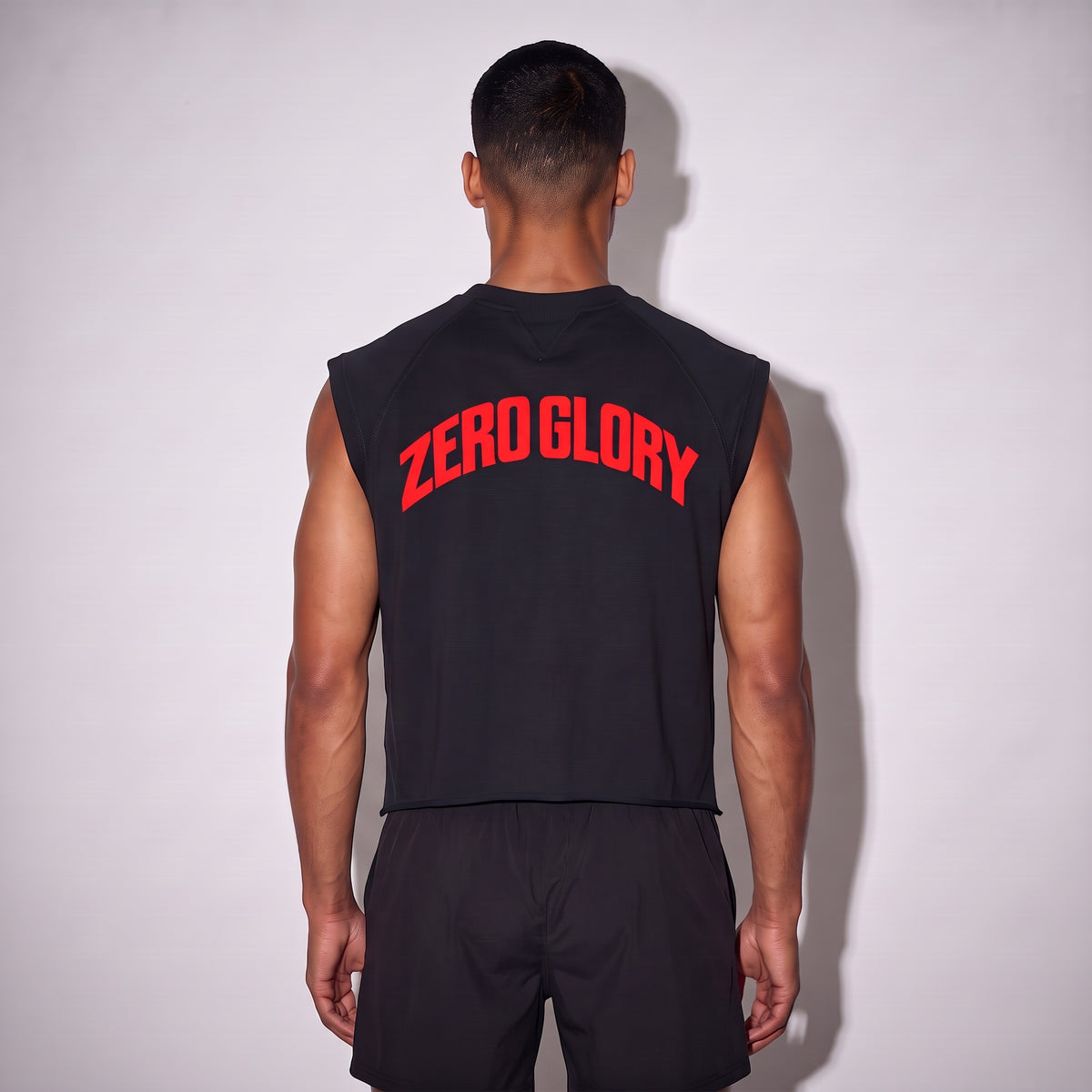 Men's Vintage Gym Graphic Tank Top featuring a bold 'ZERO GLORY' print on the back.