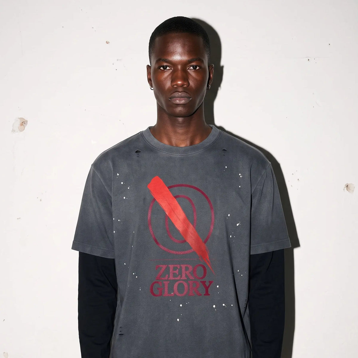 Distressed cotton long sleeve shirt featuring a gray base and red 'ZERO GLORY' graphic design.