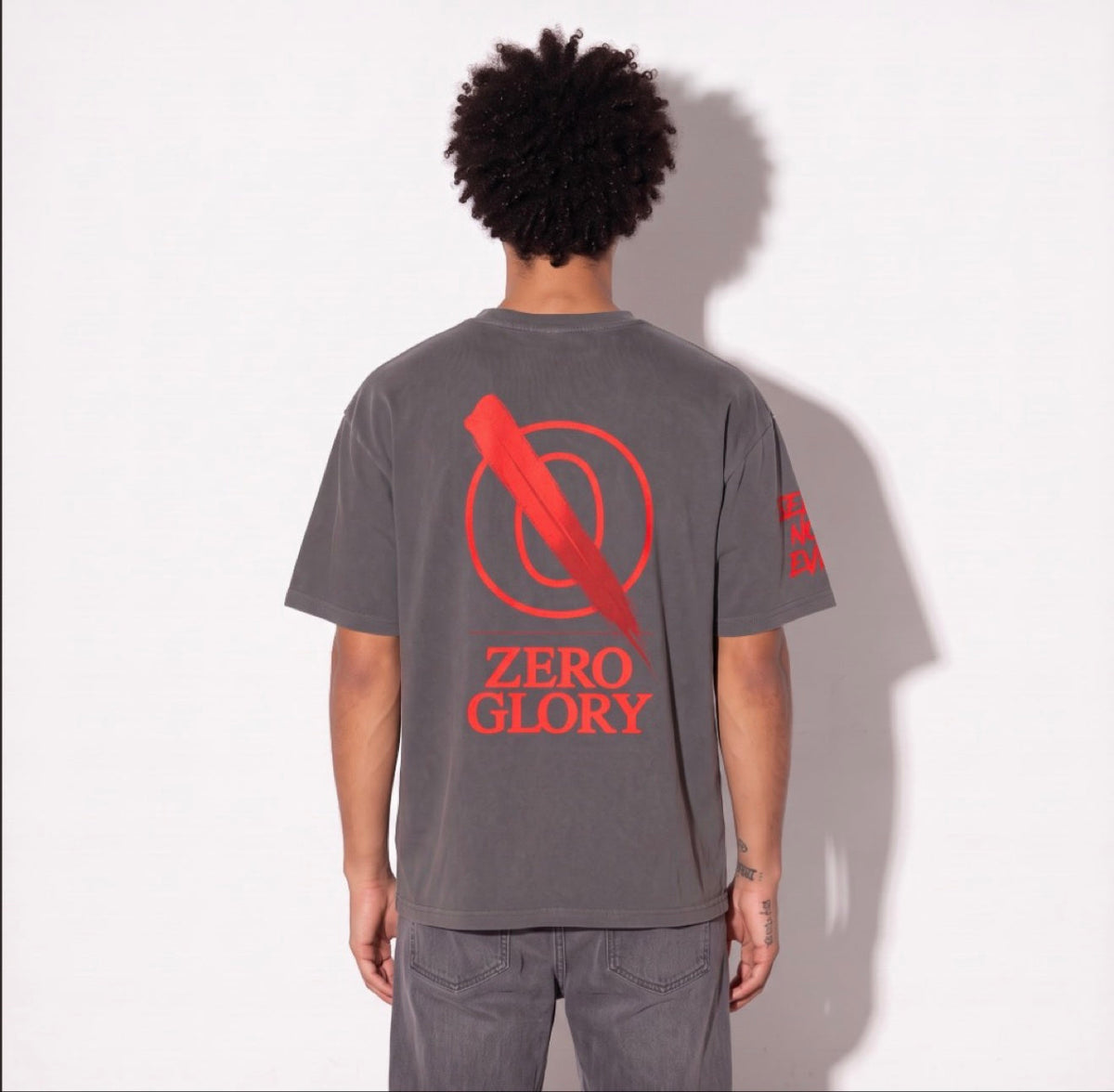 Y2K graphic tee flat lay in vintage-washed charcoal