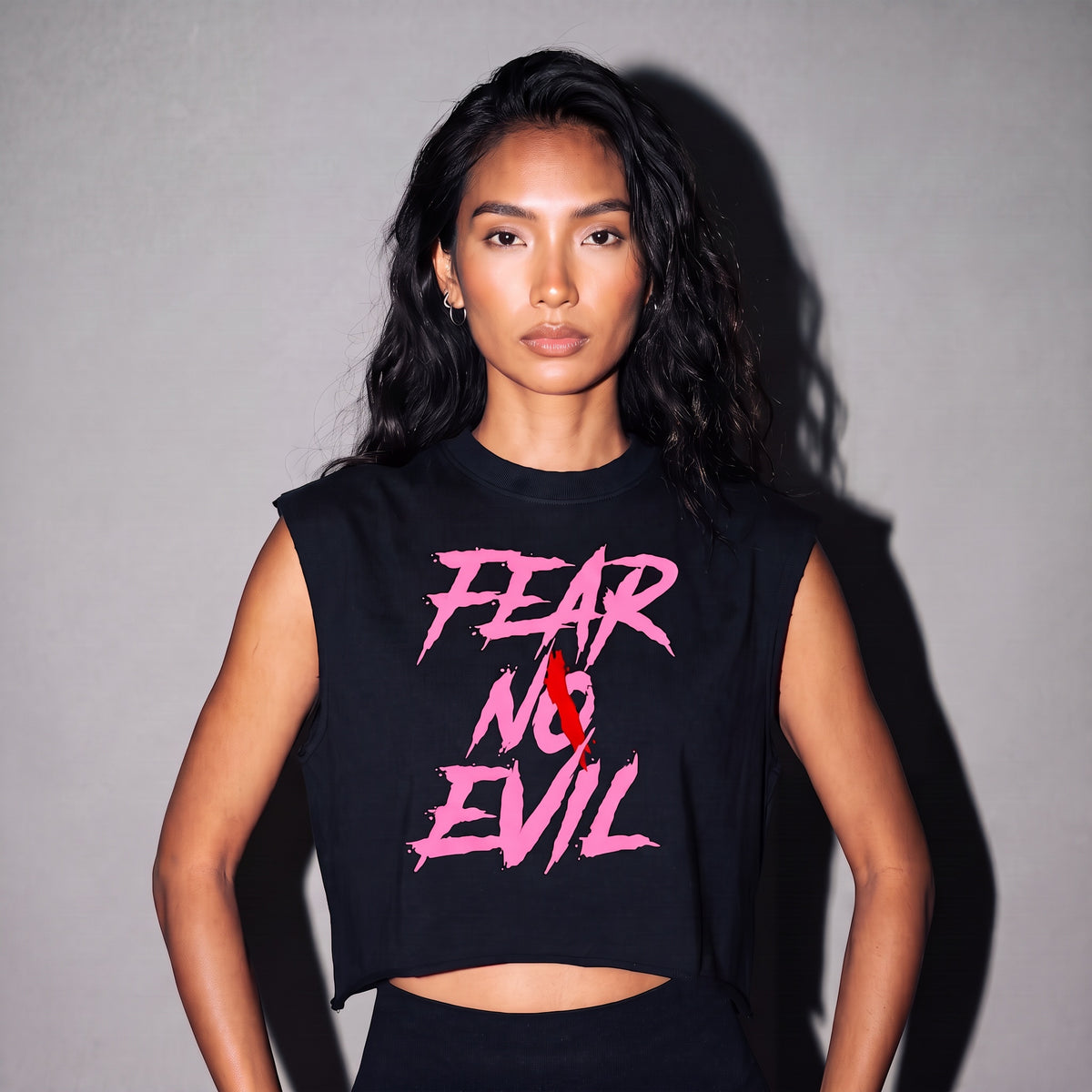 Close-up of boxy tank with FEAR NO EVIL print detail