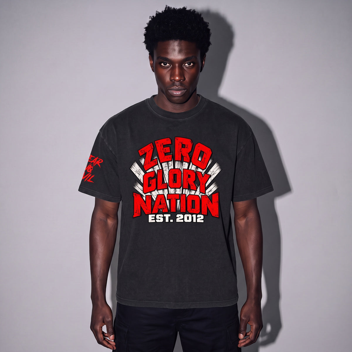 Y2K graphic tee in vintage-washed charcoal with sunburst front print