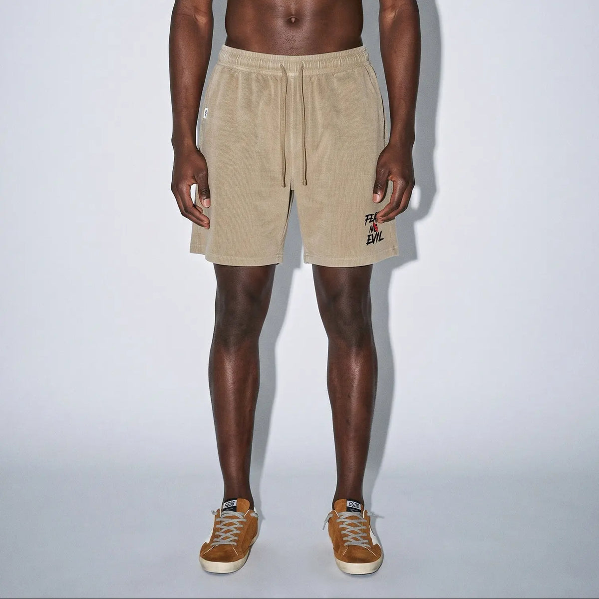 Fear No Evil Refined Waffle Shorts in beige, featuring an adjustable waistband and relaxed fit for comfort.